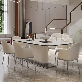 Сочетание обеденного стола и стула из итальянского сланца Простой современный прямоугольный французский кремовый стол wind white
